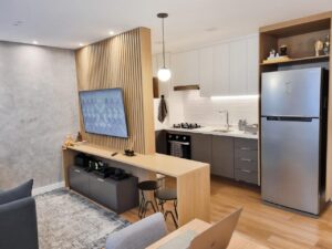 Apartamento moderno na Mooca para um homem solteiro que ama tecnologia. Layout integrado, design contemporâneo e espaços funcionais criam um lar urbano e sofisticado.